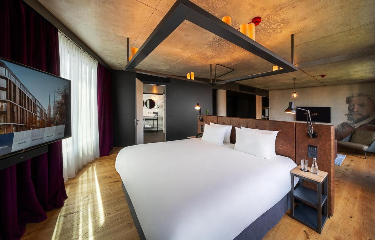 เดอะ บริดจ์ วรอตซวาฟ - เอ็มแกลเลอรี Hotel ภายนอก รูปภาพ A suite at the hotel