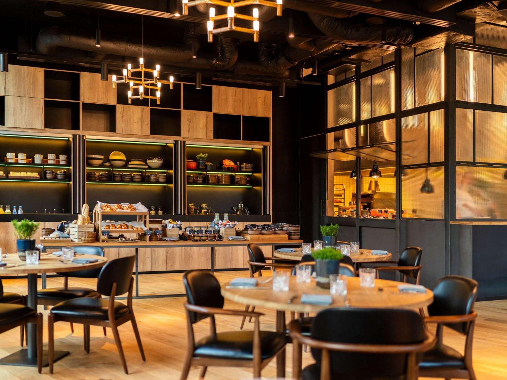 เดอะ บริดจ์ วรอตซวาฟ - เอ็มแกลเลอรี Hotel ภายนอก รูปภาพ Interior of the restaurant
